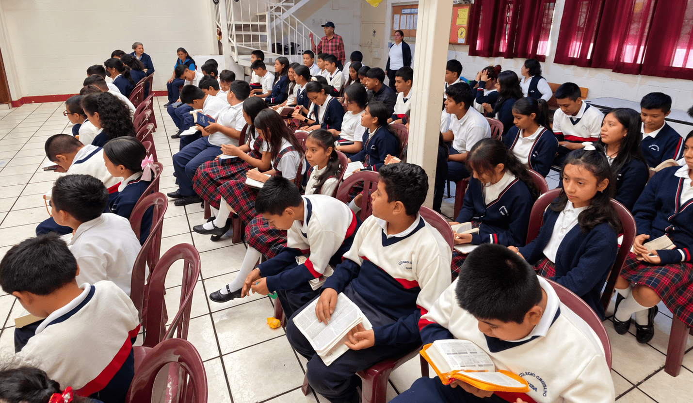 Students reading together in the school hall