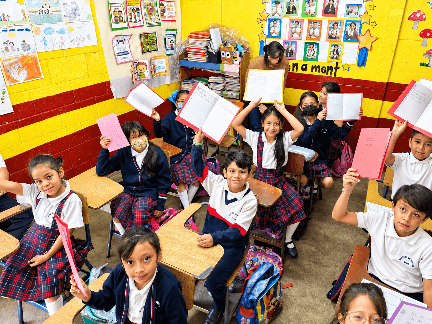 Colegio Vida students showing their work in the classroom