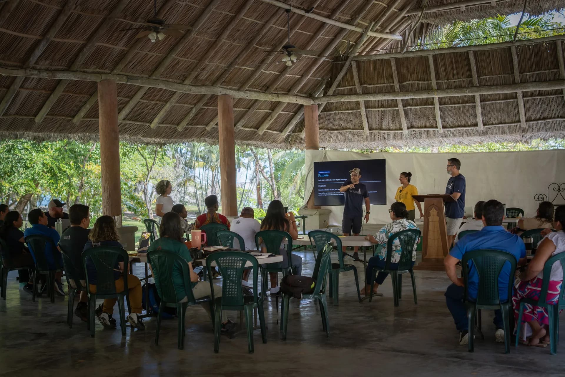 Guests listen to a presentation during a marriage retreat at El Faro.