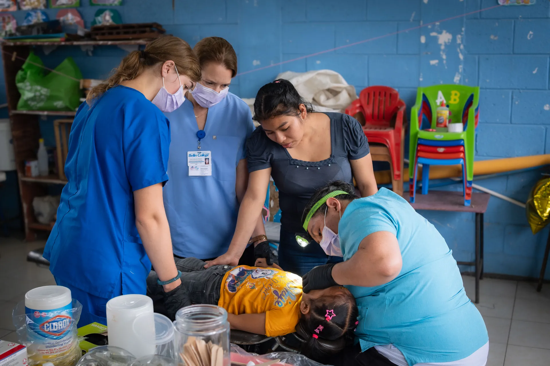 Dental volunteers care for a patient at a community clinic in Guatemala.