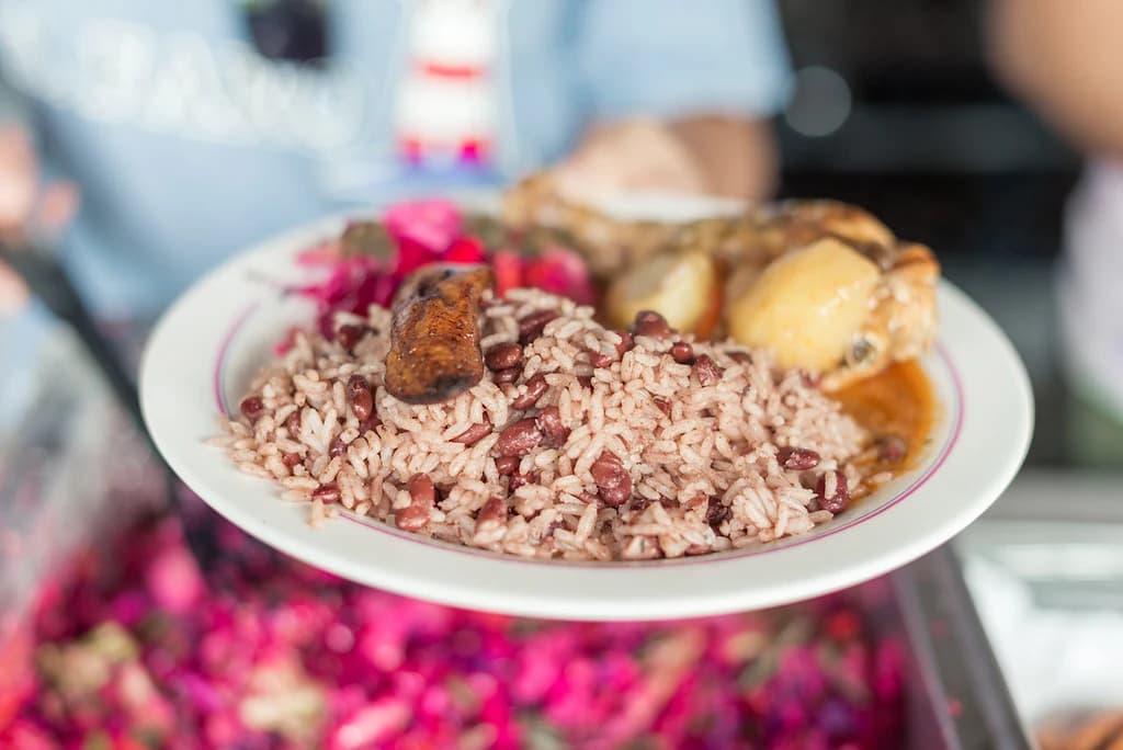 A plate of rice, beans, and plantains.